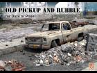 Old pickup and rubble